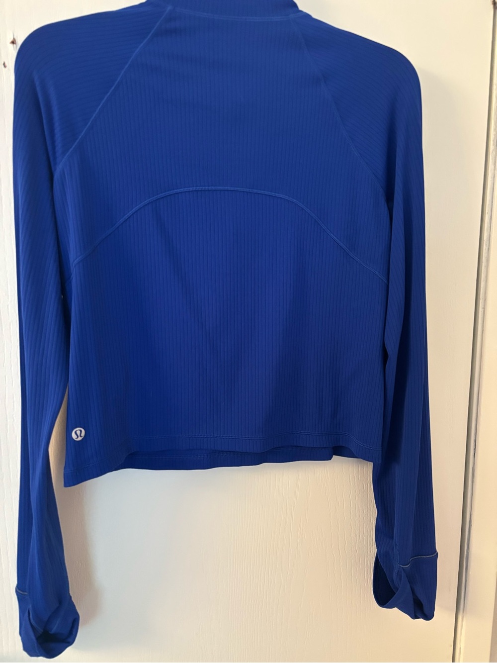 Lululemon it’s rulu half zip waist length size large (fits an 8 IMO) - Picture 3 of 4
